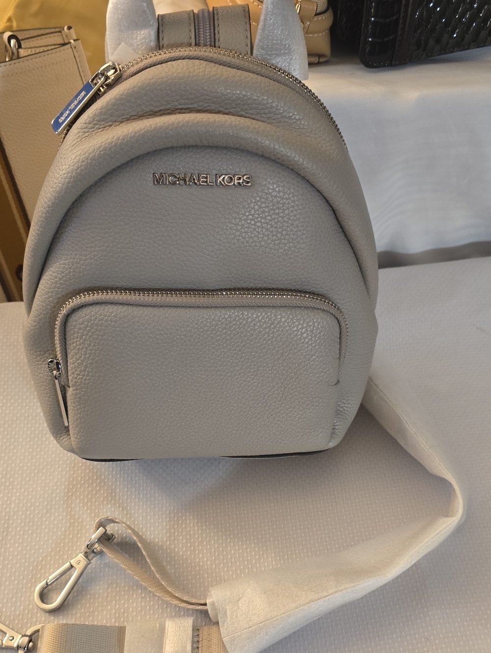 Michael Kors Pebbled Mini Backpack in Light Gray